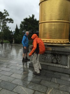 Anil turning giant prayer wheel