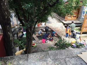 Woman washing at traditional washing place