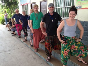 Showing off our colourful pants purchased in Dali