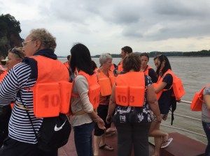 On board boat crossing river to see The Grand Buddha