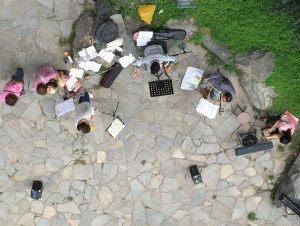Musicians in park below Xian walls