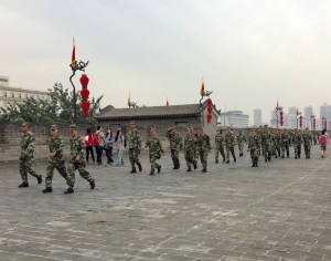 Chinese soldiers sightseeing on Xian wall