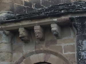 Gargoyle like carved faces