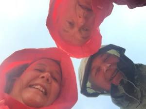 Three happy Peregrinos atop Alto de Mojapan