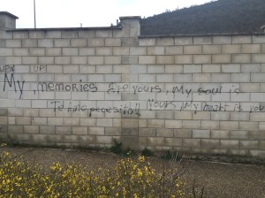 Interesting graffiti on passageway wall